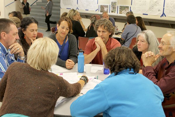 South Whidbey community members and South Whidbey Elementary School Principal Jeff Cravy discuss possible changes to the school district's facilities usage at a planning meeting Wednesday night.