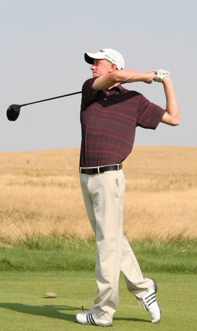 Harrison Price eyes his drive at Palouse Ridge Golf Club in Pullman last weekend. The Falcon senior placed 23rd and shot a second-day score of 70 strokes.