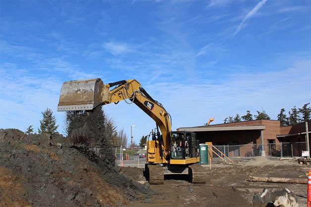 Heavy machinery works at WhidbeyHealth Medical Center in Coupeville. Work on the voter approved $50 million expansion is on time and on budget