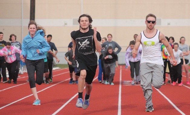 Tanner Lobdell strides down the 100-meter stretch during a recent practice.