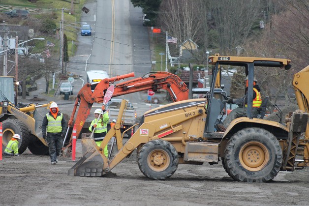 A crew works on Second Street in this photo from February 2014. Designs for the reworked roadway neglected an access to a lot next to Langley City Hall.