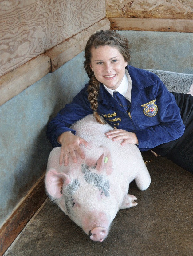 Karli Zwade shows her skills as an avid animal lover who raises hogs for the Puget Sound Livestock Show and the Northwest Washington Fair.