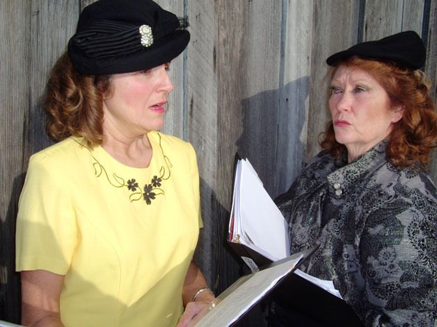Joyce Napoletano plays the long-suffering Helen Trent and Annie Horton is the evil gossip columnist Daisy Parker during a recent rehearsal for “The Romance of Helen Trent
