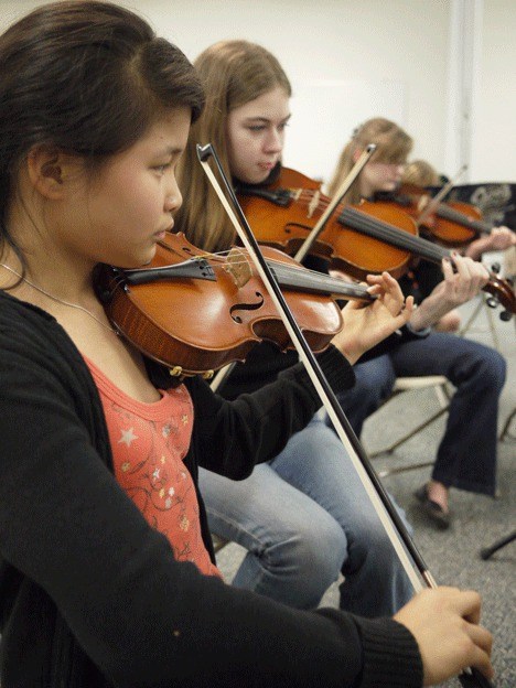 Katyrose Jordan and Gretchen Schlomann play with the Whidbey Island Youth Orchestra.