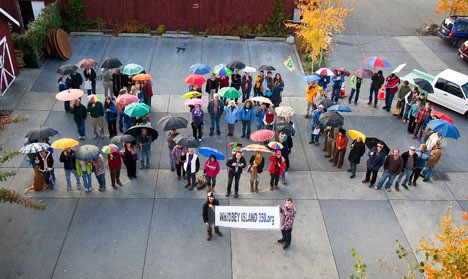 More than 60 people showed up at Bayview Corner last October to spell out “350