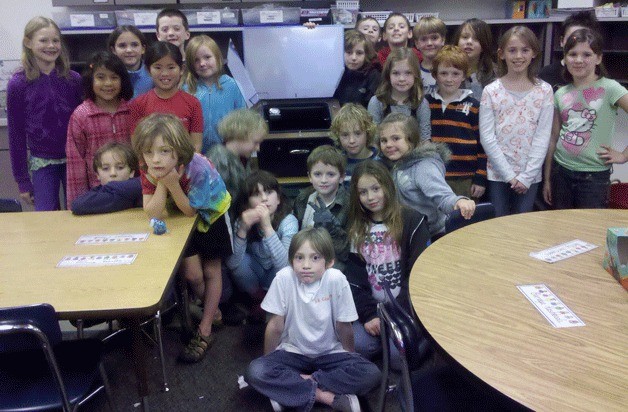 Kathy Stanley's combined class of second- and third-graders  with its solar oven.