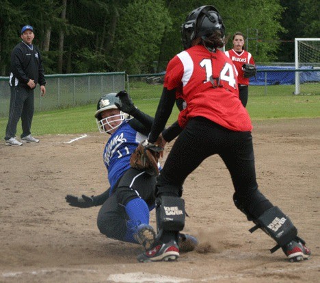 Falcon Alex Kubeska is tagged out at home plate during Monday’s 6-5 win over Archbishop Murphy. Though she didn’t score