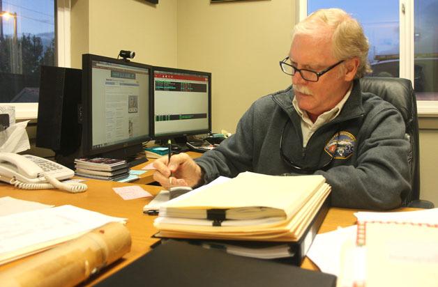 Fire Chief Rusty Palmer works on the district’s 2014 budget.
