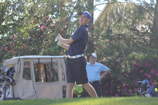 South Whidbey junior Thorin Helmersen hit a 300-yard drive on hole six during a three-team match Monday afternoon at Useless Bay Golf and Country Club. Helmersen finished the 18-hole round with an 85