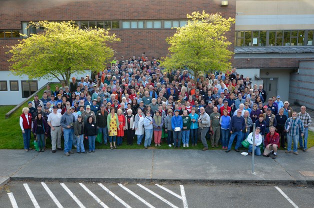 Hearts & Hammers of South Whidbey volunteers pose for a group photo during the 2015 event. This year’s workday is Saturday.