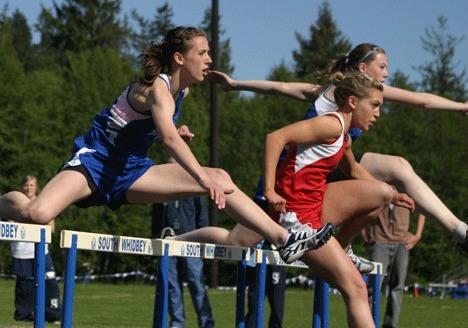 Halfway through the 100-meter hurdles during last week’s track meet