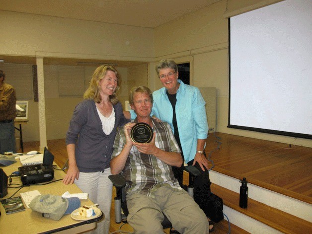 Joy and Craig Johnson receive the Whidbey Audubon Society’s Excellence Award by Society President Ann Casey. The Johnsons are the first recipients of the award.