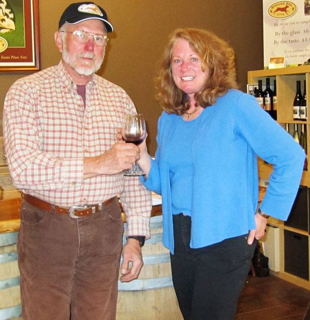 Spoiled Dog Winery vintners Jack and Karen Krug enjoy one of their winning wines at the Taste 4 Wine tasting room at the Bayview Cash Store.