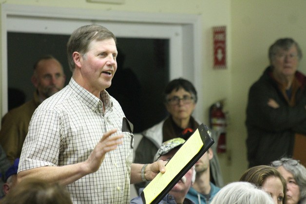 Ray Gabelein Jr. raises a handful of questions and concerns about the proposal to redesign several parts of the Island County Fairgrounds at the last South Whidbey public input meeting in late March.