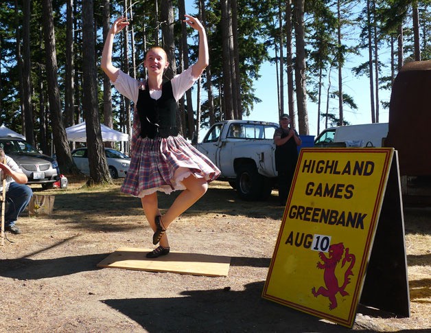 Oak Harbor resident Fionna Strong dances recently at the Oak Harbor Public Market. She was dancing to encourage people to attend the Highland Games