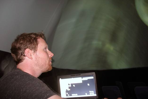 Joe Menth navigates through the universe using a software program called UniView