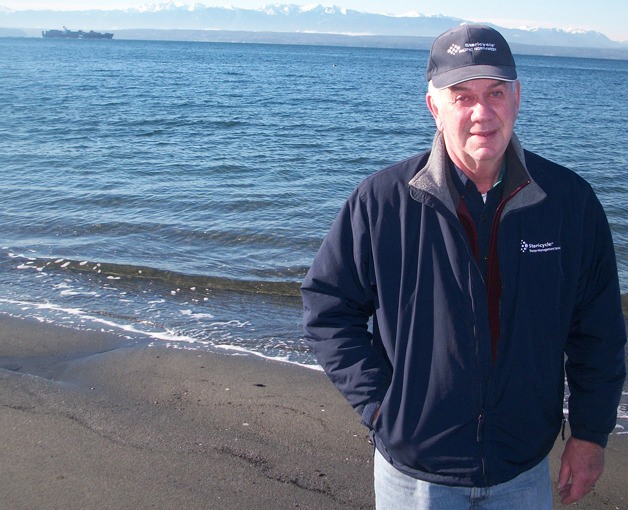 Gary Dunn enjoys a visit on a sunny Thursday to the Mutiny Bay beach that will soon come into public ownership. He’s building a house nearby and said he and others in the area would gladly volunteer to keep the beach clean.