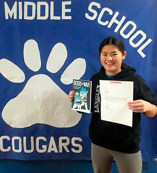 Ari Marshall won a copy of the book “Dogs of War” for her achievement.