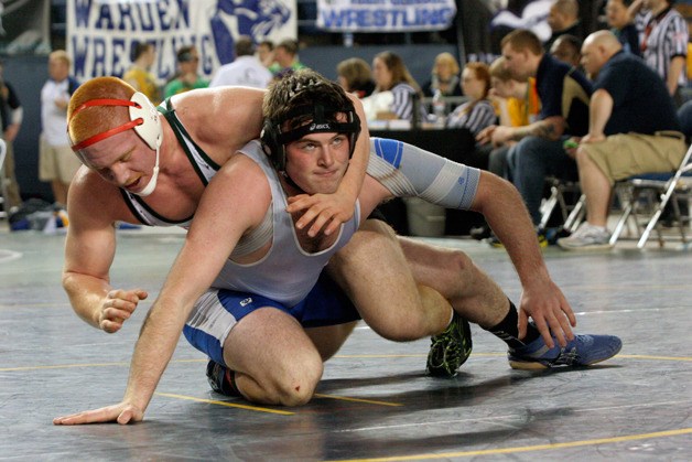 Pat Monell tries to shake off Chelan junior Asa Schwartz in the first round of the 1A state Mat Classic wrestling tournament. Monell
