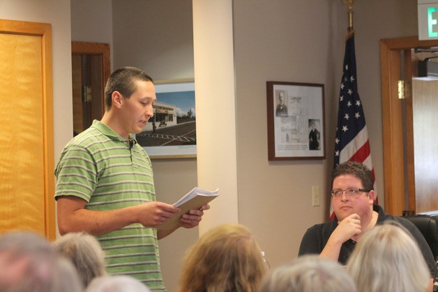 Joe Wierzbowski reads a statement to the Langley City Council and staff during a council meeting in July 2015. The owner of the first licensed food truck