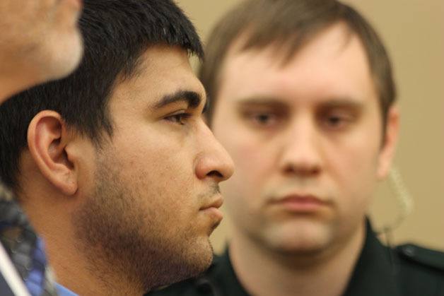 Arcan Cetin stands in court Monday.
