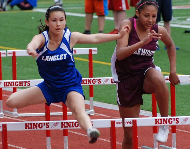 Tera Applegate clears a hurdle during the Cascade League championship meet May 31 at King’s School in Shoreline.