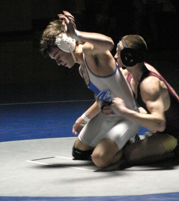 South Whidbey’s Steven Sutton gets out from under Lakewood’s Nolan Bingamon during this week’s meet at home. Sutton won the 145-pound match 13-12 in three periods