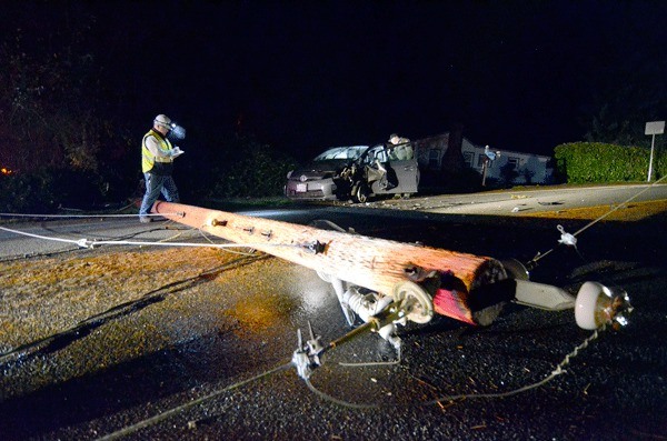 A single car crash caused a power pole to be cut in half on Sunday night.