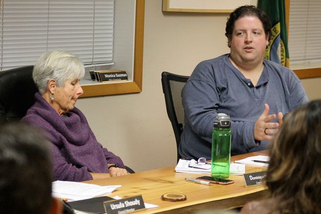 Langley City Councilwoman Dominique Emerson (left) listens to Councilman Thomas Gill (right) explain his reasoning of wanting to close Seawall Park from 12 a.m. to 6 a.m. Emerson was the lone council member to vote against the closure of the park.