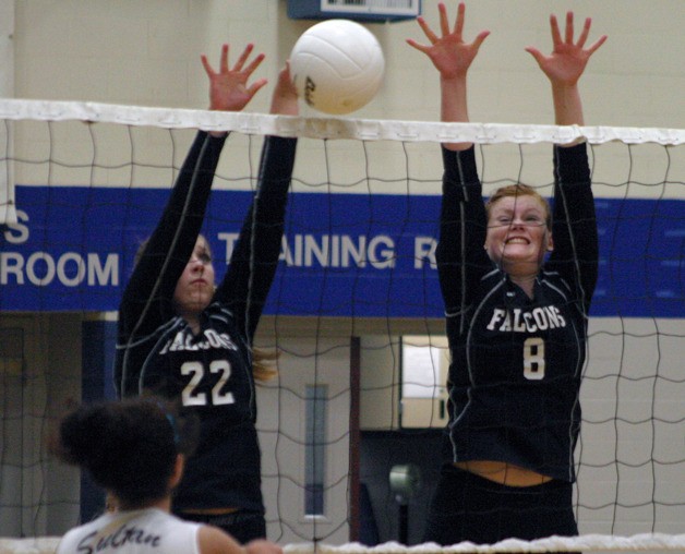 Falcon sophomore Abby Hodson blocks a tip by Turk sophomore Lalia Gonzalez. Hodson was assisted by sophomore Anne Madsen