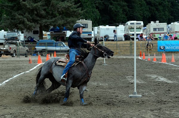 Hunter Newman turns the corner while competing in the horse events at the Whidbey Island Fair in August.