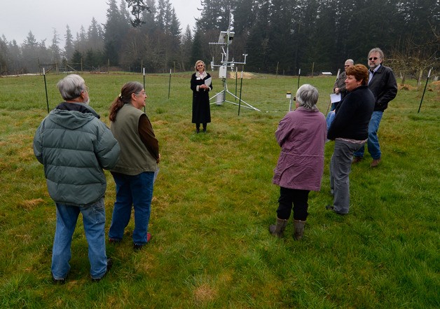 The people responsible for putting an AgWeather station on South Whidbey gather for a group photo after the dedication of the device Monday