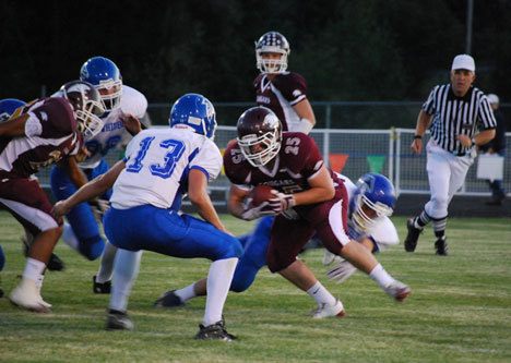 Falcon defensive back Hunter Rawls prepares to stop Lakewood quarterback Justin Lane during South Whidbey’s 59-32 win over the Cougars.