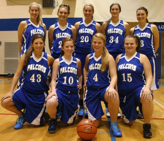 The 2011 varsity Falcon girls basketball team. Back row: Hayley Newman