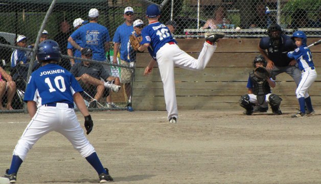 Pacific All-Stars pitcher Tygan Duncan throws to South Whidbey’s Ethan Petty with Dexter Jokinen on second base in the Washington Little League 9- and 10-year-old All-Stars tournament July 14.