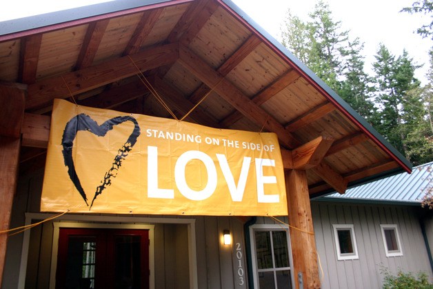 This banner hangs above the entrance to the Unitarian Universalist Congregation of Whidbey Island in Freeland. The multi-religious congregation supported marriage equality for same-sex couples and the approval of Referendum 74.