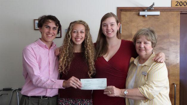 Three youth scholarships were recently awarded to Josiah Colby (far left)