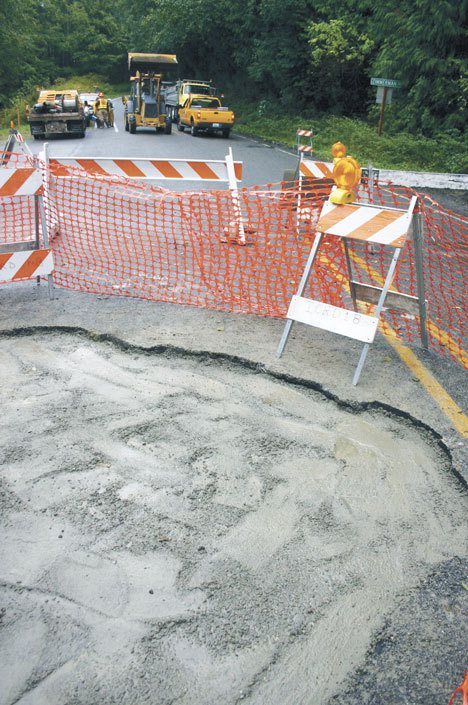 County crews worked over the weekend to fill a 20-foot-deep sinkhole on Bob Galbreath Road.