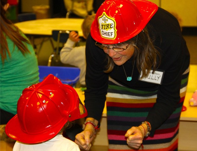 Mully Mullally won’t wear a fire hat when she is honored at a Mothers Mentors afternoon tea on May 2. Ladies will dress in their finest fancy English garb for the event.