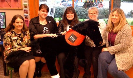 The Freeland Wells Fargo Bank branch presents 'Big Al' to the Freeland Library.