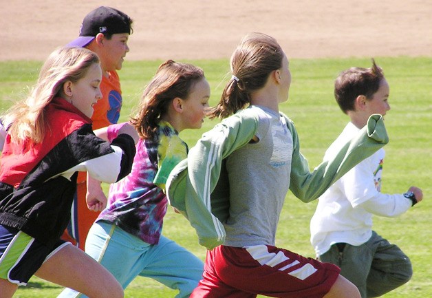 Chum Run participants run in a past race at South Whidbey Community Park. The event returns this Sunday