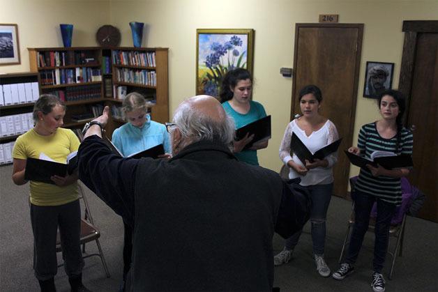 Whidbey Girls Choir Artistic Director Jerry Mader instructs his pupils during their rehearsal May 25. The choir’s full debut is at 7:30 p.m. June 10 at the Langley Methodist Church Fireside Room. They will be performing with Langley’s young violin talent