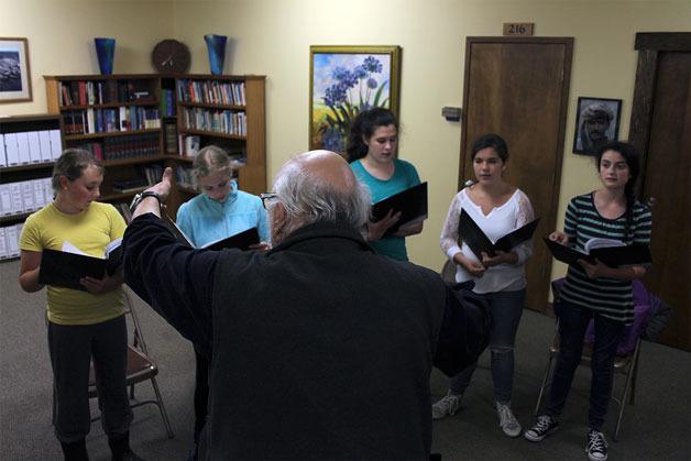 Whidbey Girls Choir Artistic Director Jerry Mader instructs his pupils during their rehearsal May 25. The choir’s full debut is at 7:30 p.m. June 10 at the Langley Methodist Church Fireside Room. They will be performing with Langley’s young violin talent