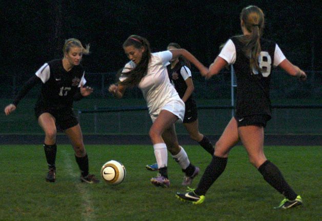 Falcon senior Maia Sparkman tries to ignite South Whidbey’s offense in the first half against Archbishop Murphy on Thursday night. The Wildcats held the Falcons scoreless.