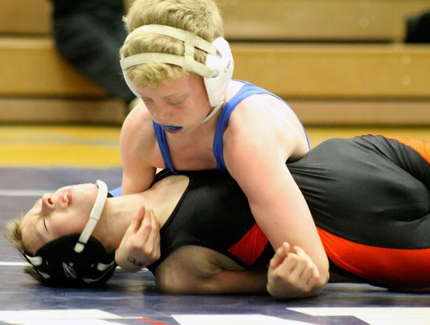 Langley Middle School wrestler Kaidyn Brinks attempts to pin his opponent from Granite Falls Middle School on March 8 at South Whidbey High School.