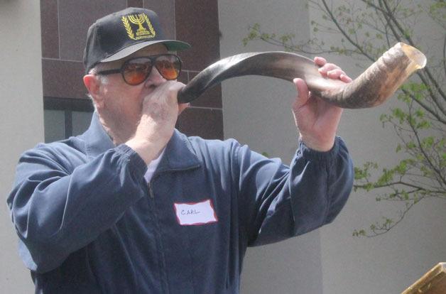 Carl Smith blows his shofar at the National Day of Prayer event in Coupeville. The shofar is a ram’s horn used in Jewish ceremonies such as Rosh Hashanah.