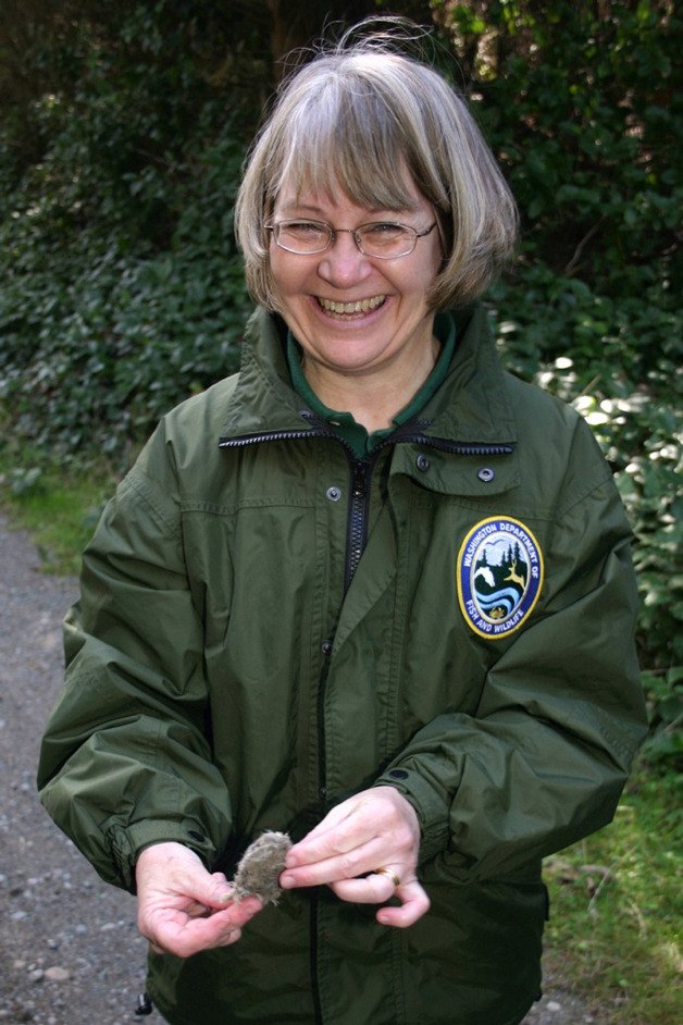 Wildlife Biologist Ruth Milner holds an owl pellet. She will teach islanders how to conserve and protect Whidbey’s  wildlife March 14.