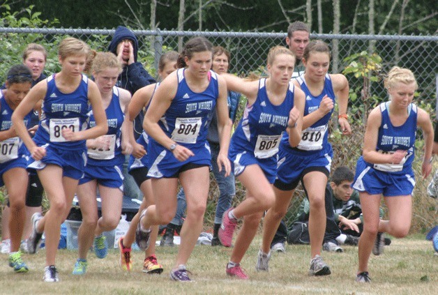 South Whidbey’s varsity girls cross country team takes its first steps at the South Whidbey Invite on Saturday. Lilli Stelling (far right) won the division two race. Also pictured from left to right: Anna Hood