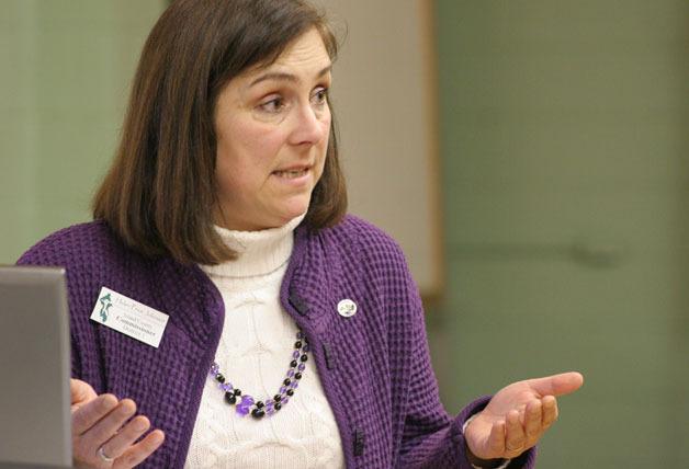 Island County Commissioner Helen Price Johnson answers a question from the audience during her talk Wednesday at the Clinton Community Hall.