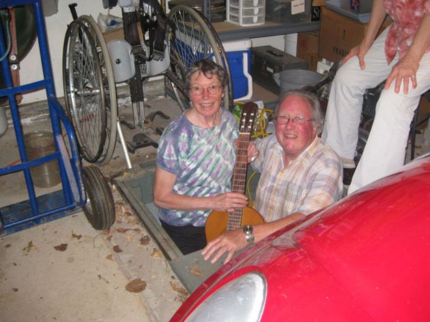 Linda and Leonard Good try out a relative’s tornado shelter in Oklahoma. The guitar symbolize’s Leonard’s boyhood in Oklahoma. At 6 years old